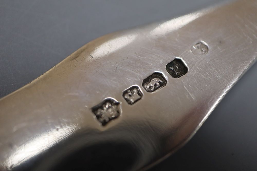 A late Victorian silver spectacles case with chatelaine clip, Birmingham, 1900, one other case? and a plated basting spoon.